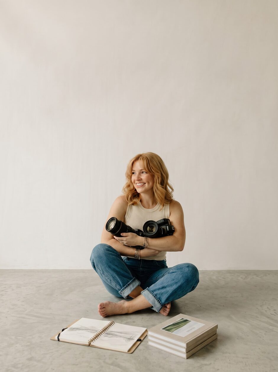 Photographer holding a camera during a session